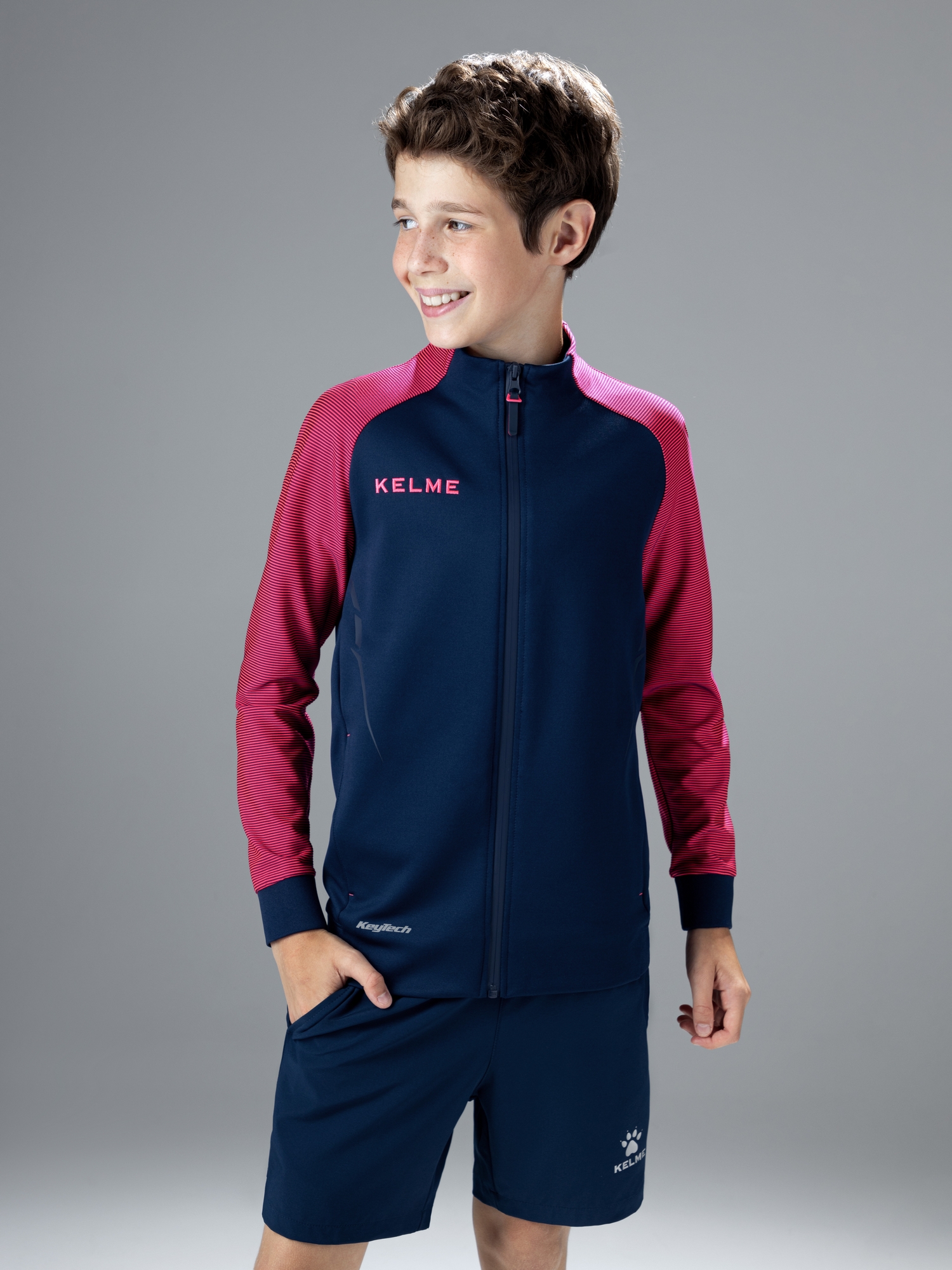 Детская олимпийка KELME Training Jacket Kid (Dark Blue/Pink)